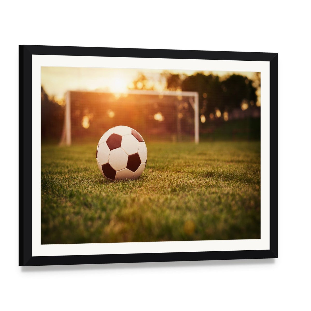 Soccer at Sunset Canvas Wall Art, framed print with white mat and black frame, angled product view