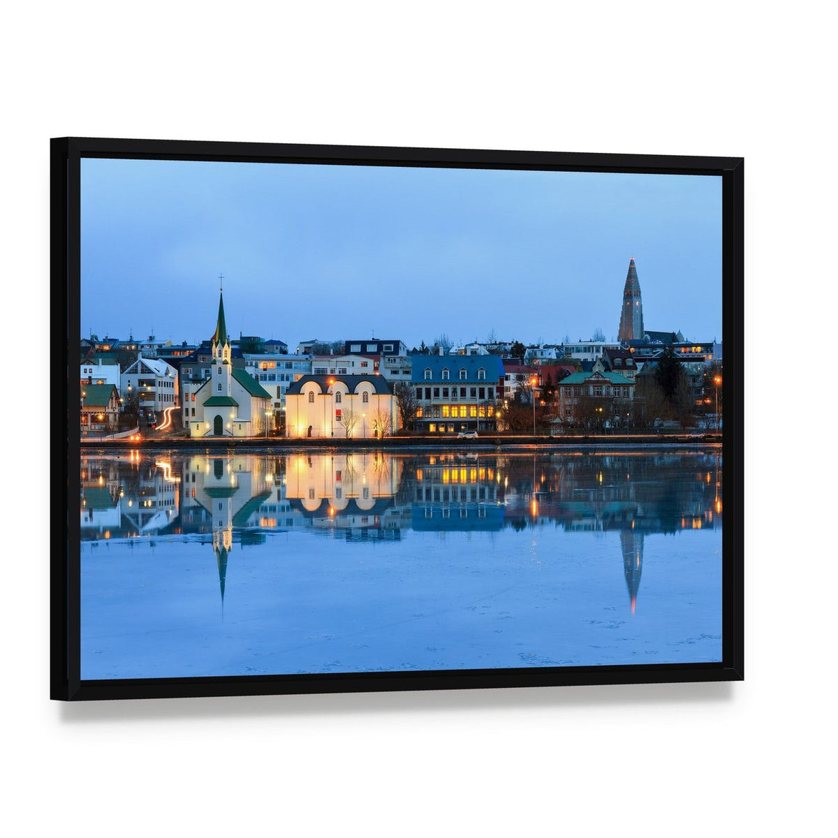 Reykjavik Reflection at Dusk Canvas Wall Art, framed canvas in a black floater frame, angled product view