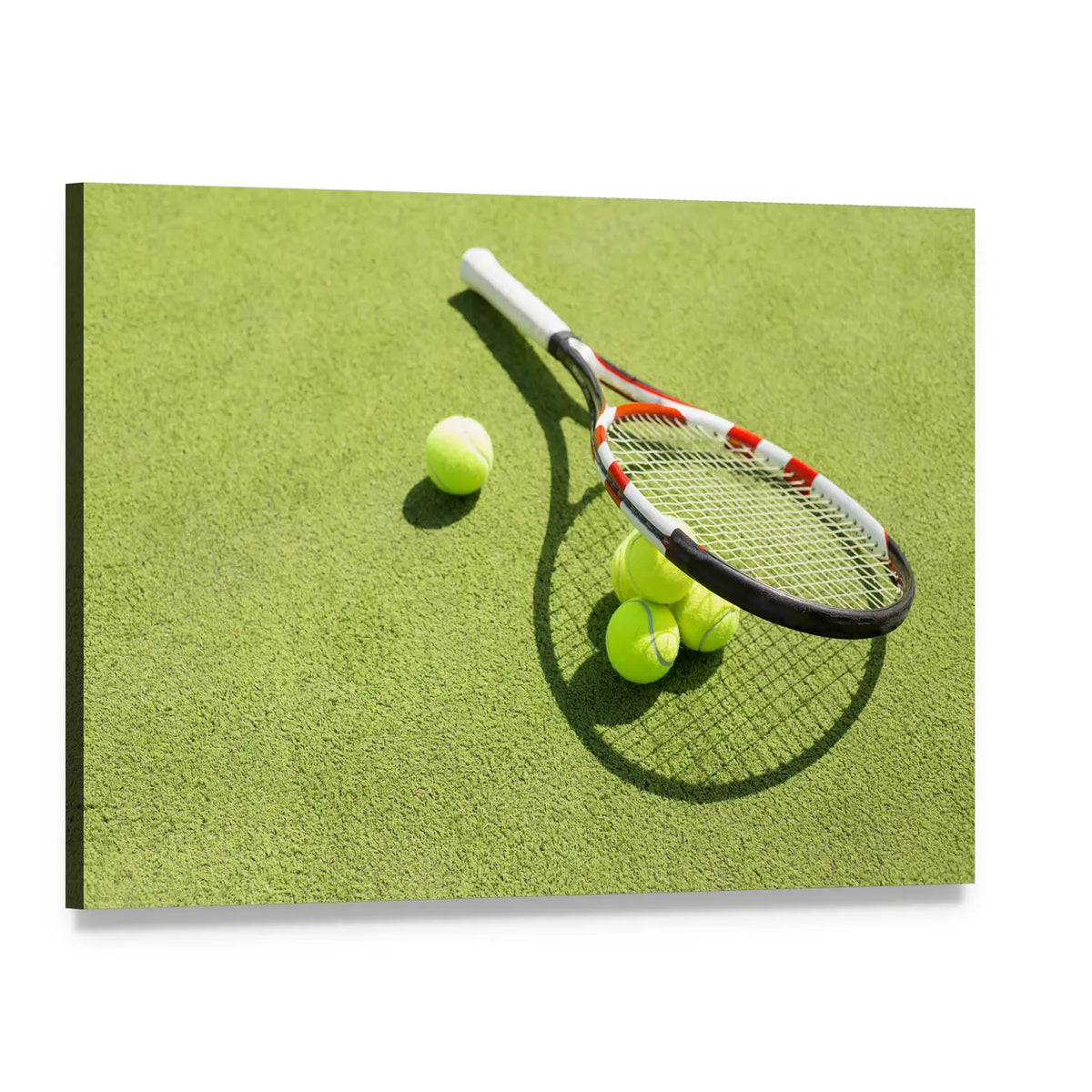 Tennis Racket and Four Balls on Grass Canvas Wall Art, single panel gallery wrapped canvas, angled product view