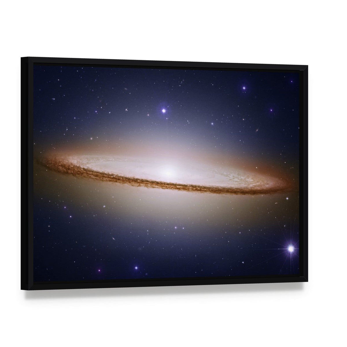 Sombrero Galaxy Canvas Wall Art, framed canvas in a black floater frame, angled product view