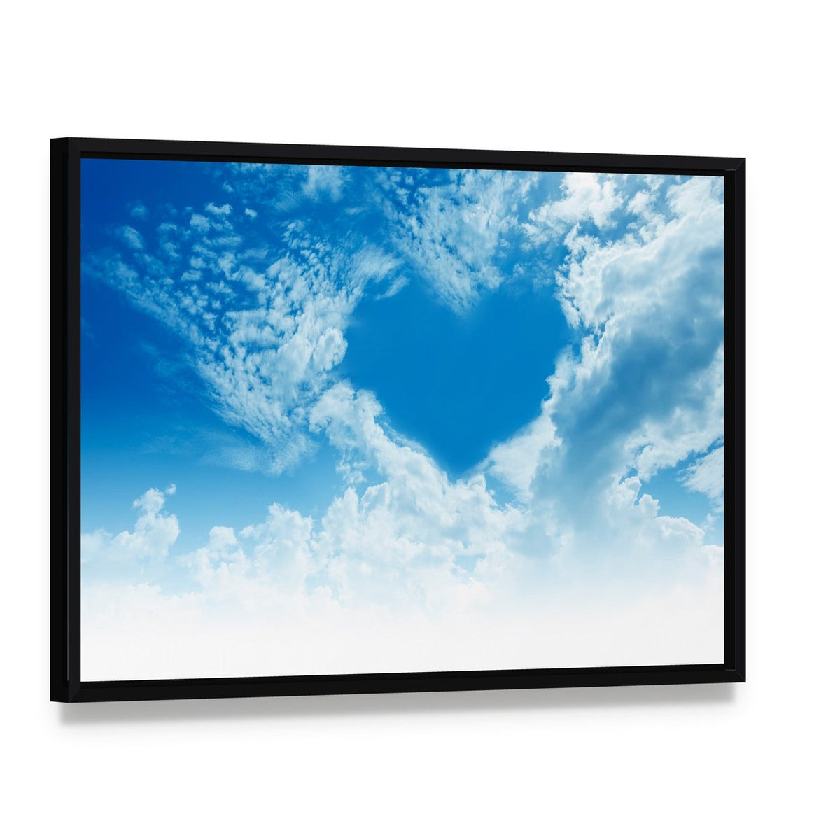Sky Clouds Forming a Heart Shape Canvas Wall Art, framed canvas in a black floater frame, angled product view