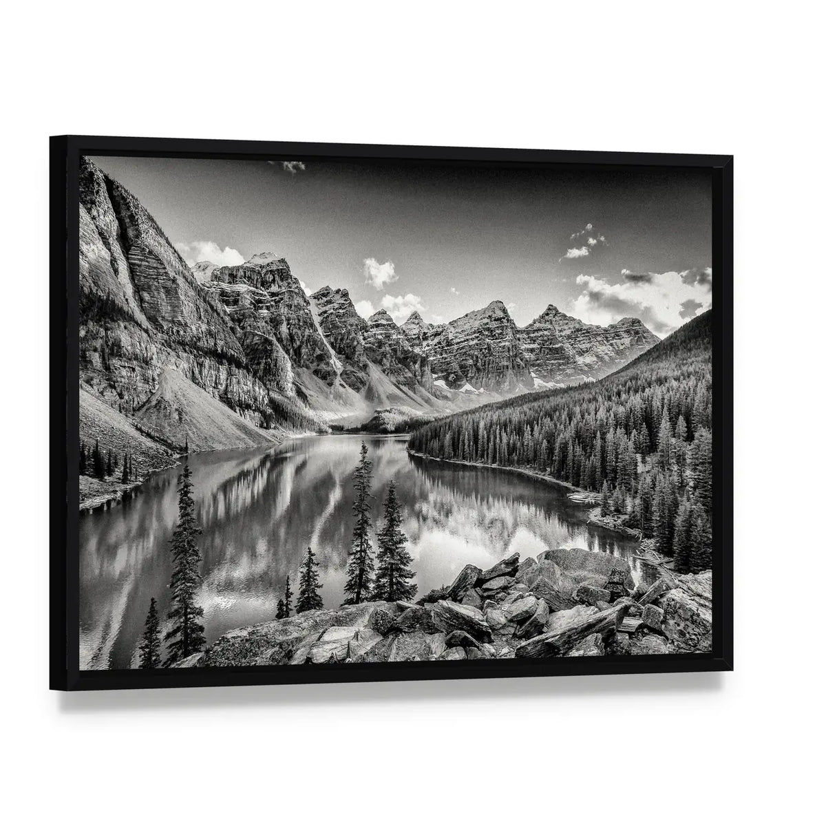 Glacial Mountain Lake with Pine Reflections Canvas Wall Art, framed canvas in a black floater frame, angled product view