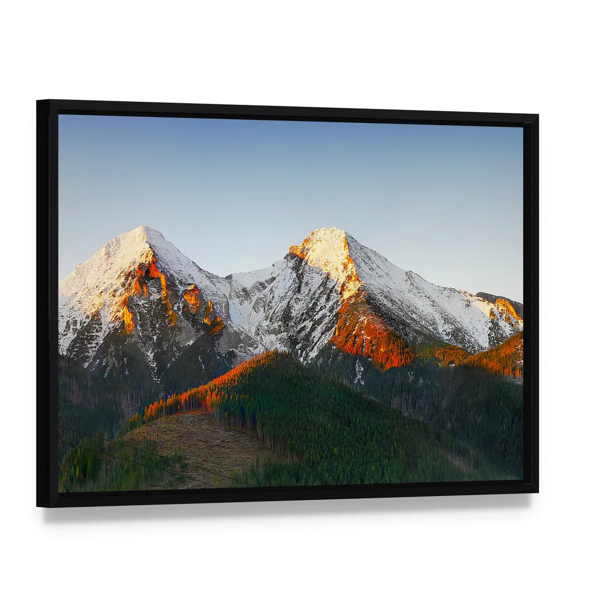 Snow-capped Peaks at Sunrise Canvas Wall Art, framed canvas in a black floater frame, angled product view