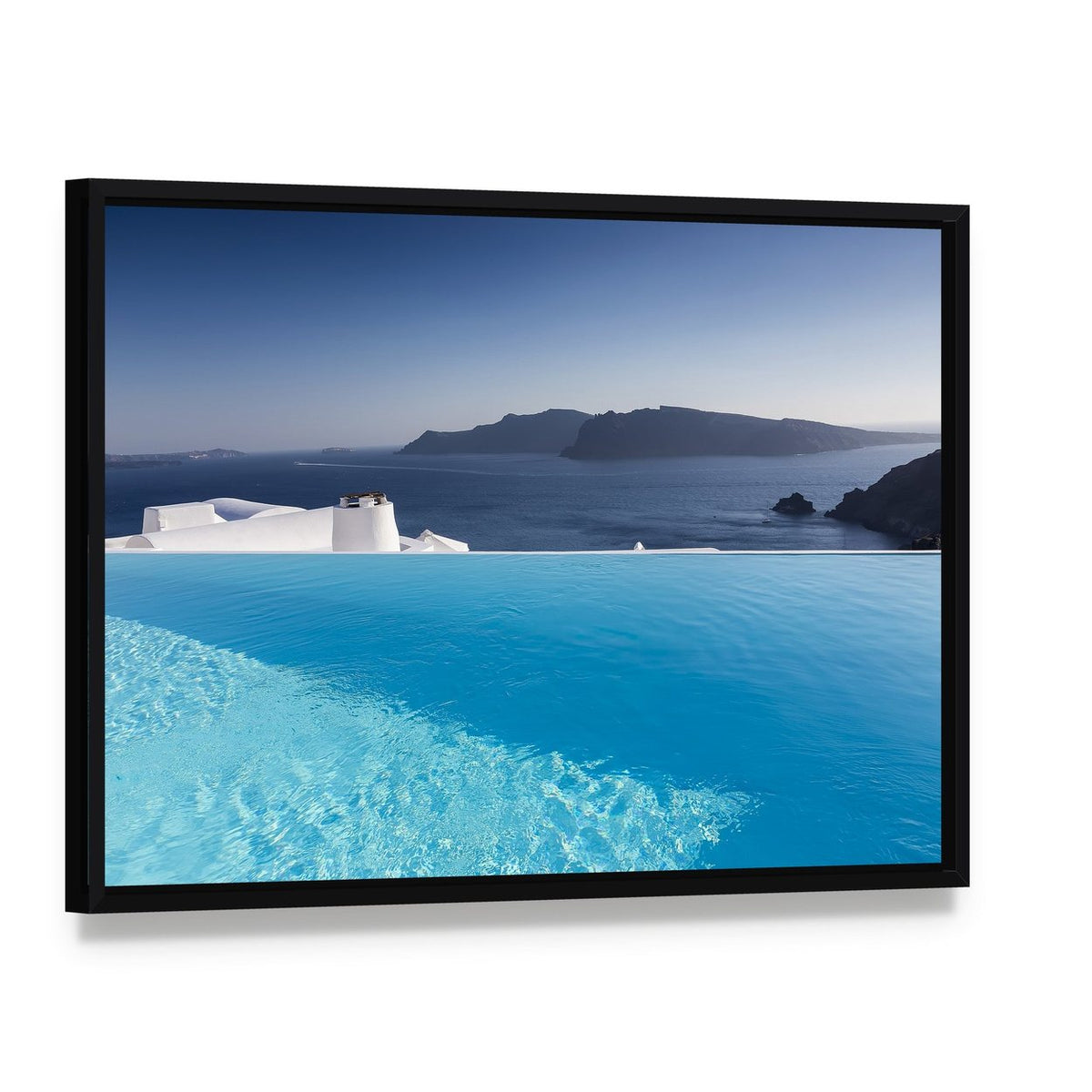 Infinity Pool at Luxury Resort Overlooking Ocean Canvas Wall Art, framed canvas in a black floater frame, angled product view
