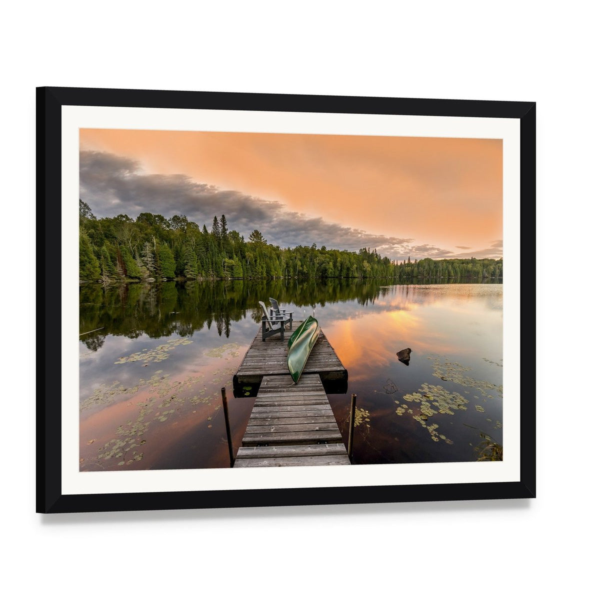 Green Canoe and Dock Chairs at Sunset Canvas Wall Art, framed print with white mat and black frame, angled product view