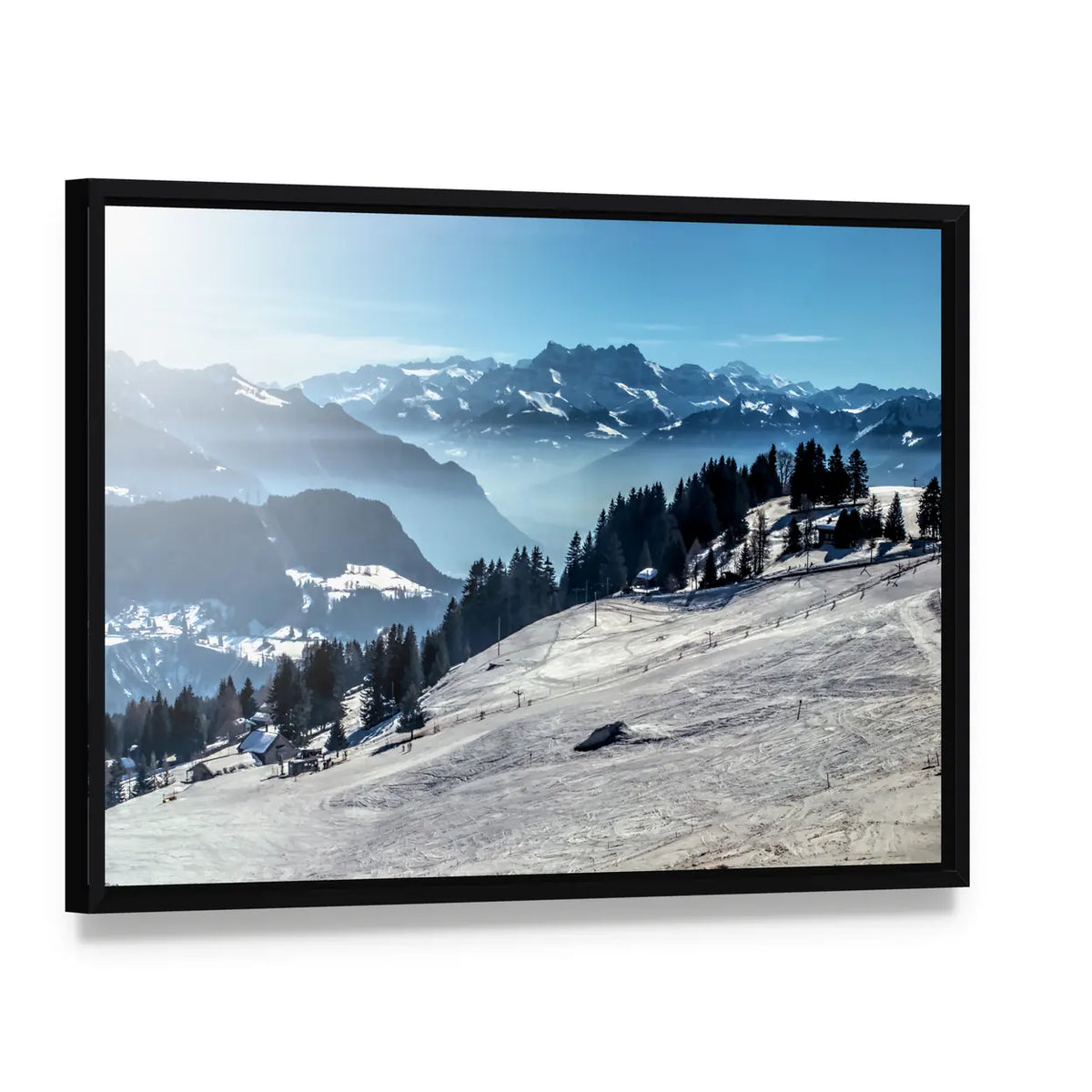 Winter Mountain Ski Slope Canvas Wall Art, framed canvas in a black floater frame, angled product view