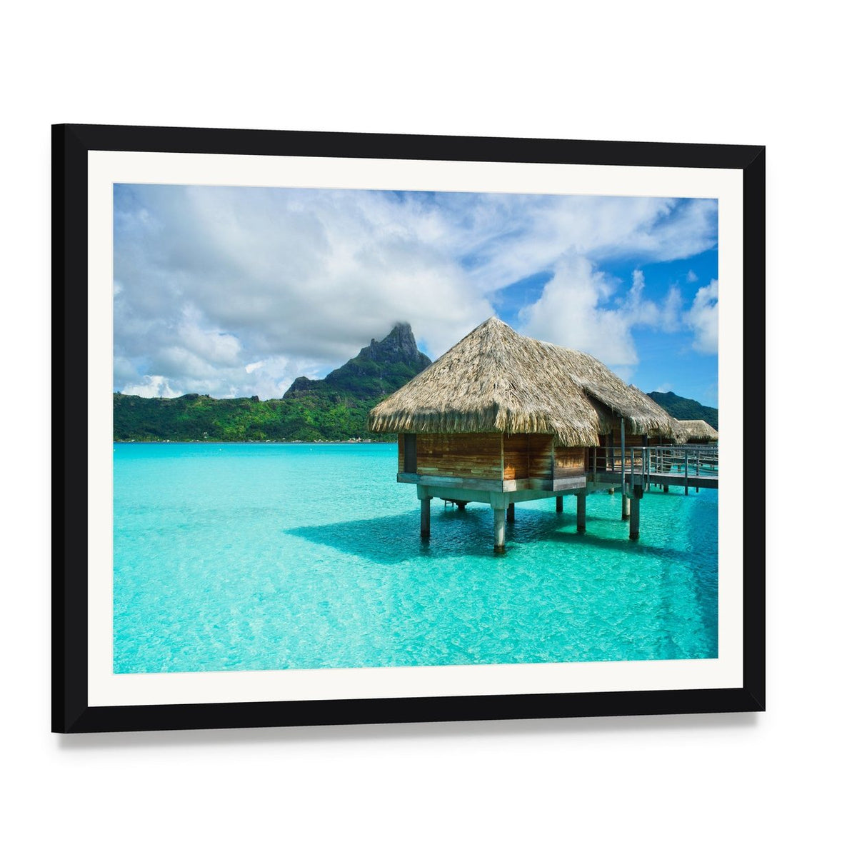 Thatched Roof Bungalow Over Turquoise Water Canvas Wall Art, framed print with white mat and black frame, angled product view