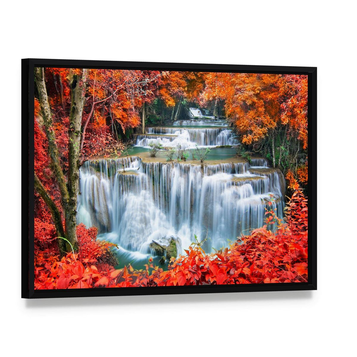 Waterfall in Autumn Forest Canvas Wall Art, framed canvas in a black floater frame, angled product view