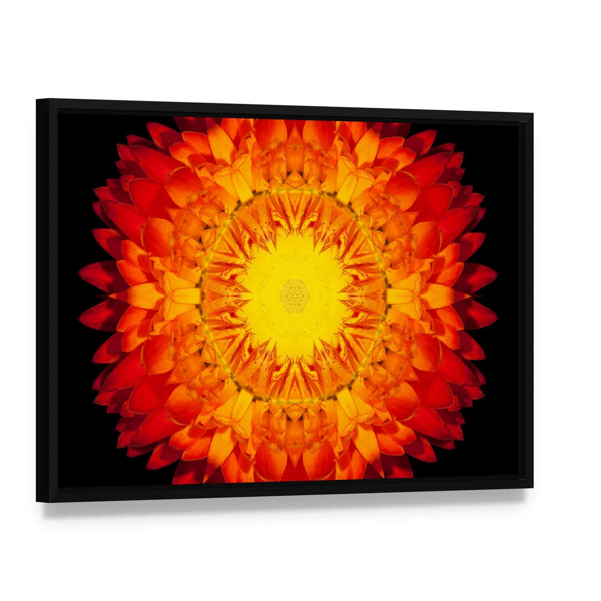 Red Flower Mandala Canvas Wall Art, framed canvas in a black floater frame, angled product view