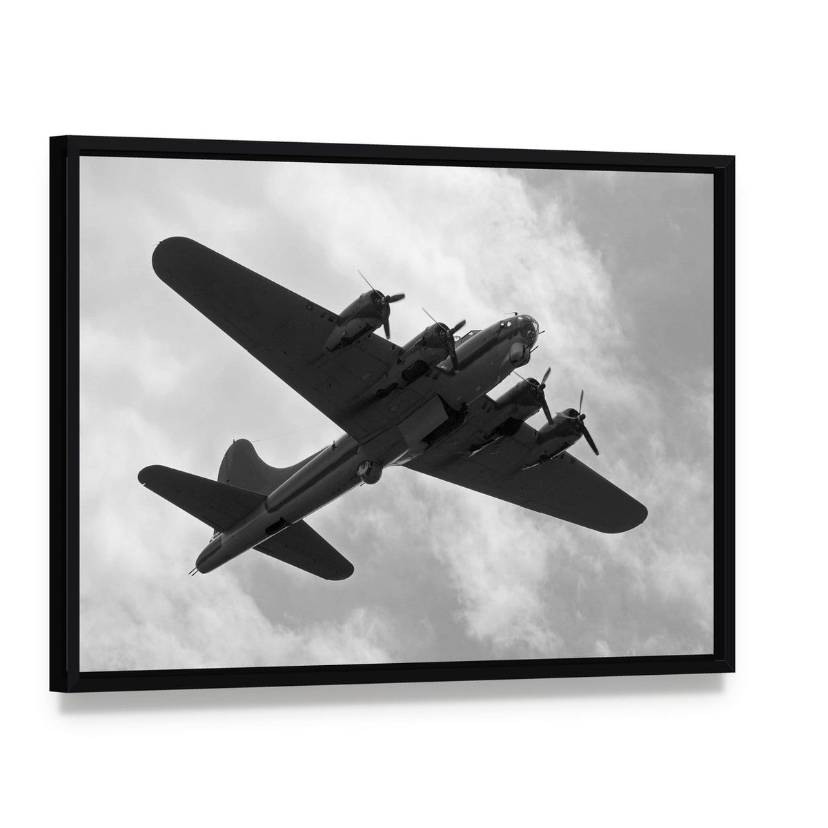 World War Ii Heavy Bomber on a Mission Canvas Wall Art, framed canvas in a black floater frame, angled product view