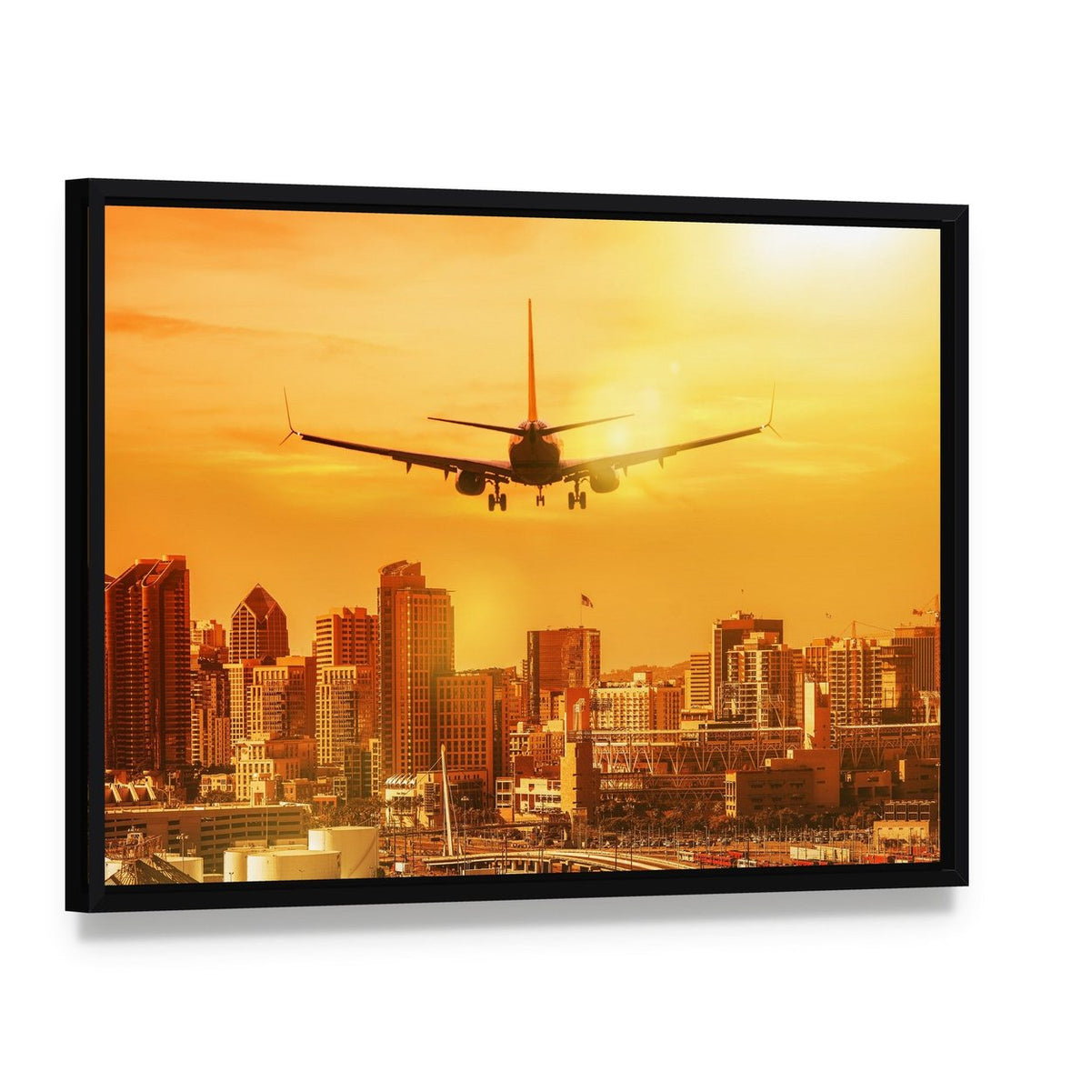 Airplane Flying Towards City Skyline Canvas Wall Art, framed canvas in a black floater frame, angled product view