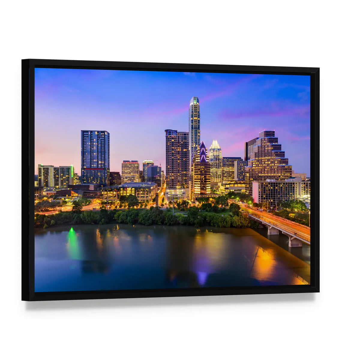 Austin Downtown Night Skyline Canvas Wall Art, framed canvas in a black floater frame, angled product view
