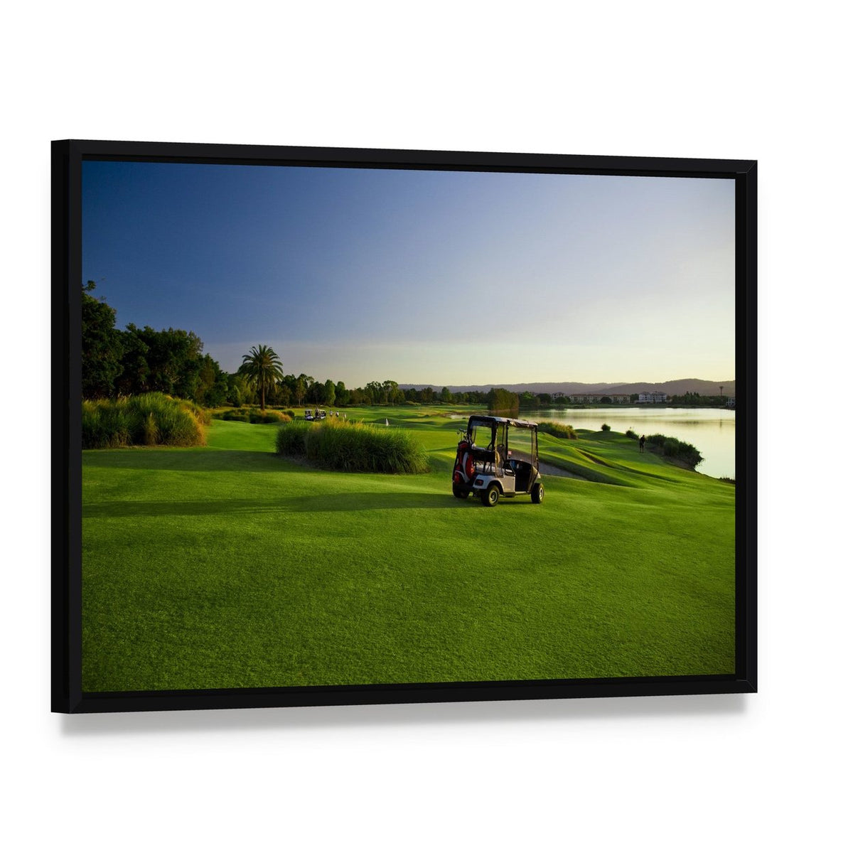 Golf Course and Buggies Canvas Wall Art, framed canvas in a black floater frame, angled product view