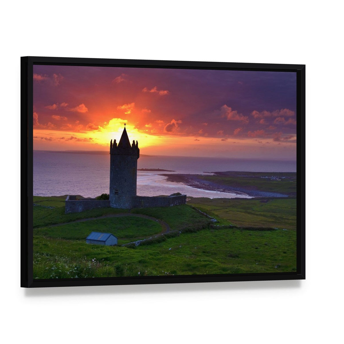 Coastal Castle at Sunset Canvas Wall Art, framed canvas in a black floater frame, angled product view