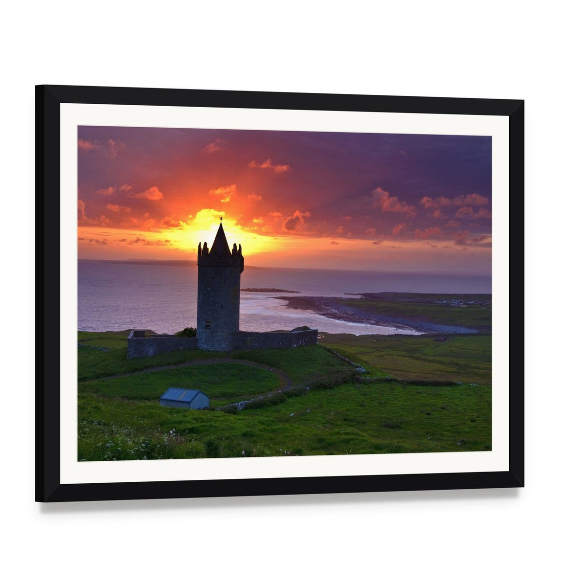 Coastal Castle at Sunset Canvas Wall Art, framed print with white mat and black frame, angled product view
