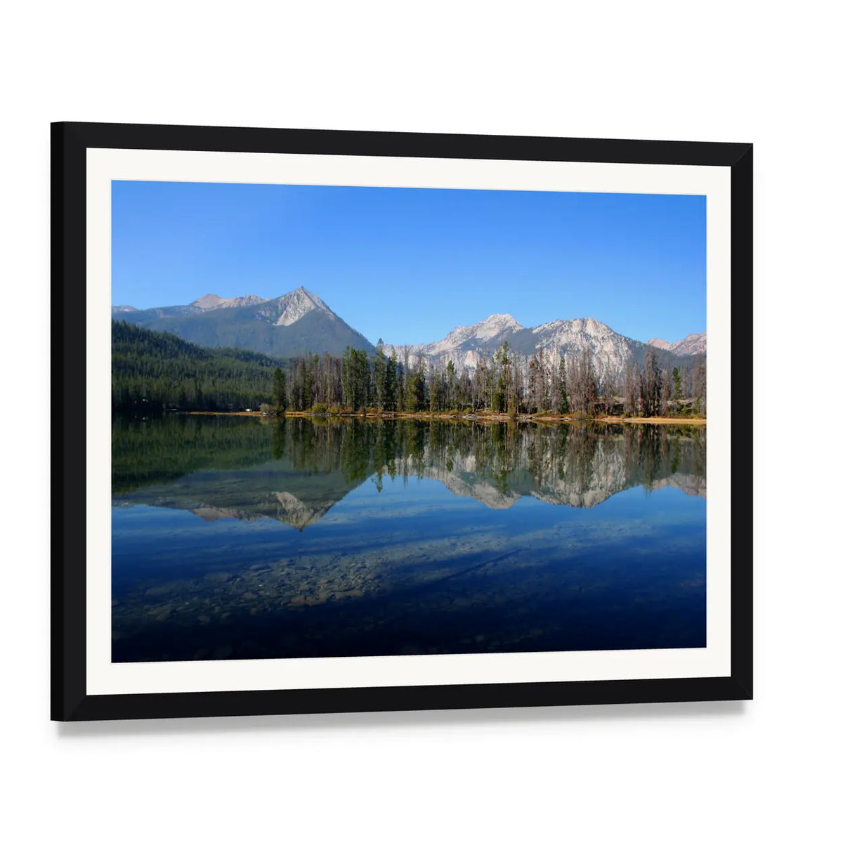 Lake and Sawtooth Mountain Canvas Wall Art, framed print with white mat and black frame, angled product view