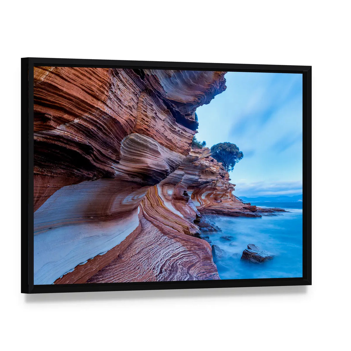 Painted Cliffs on Maria Island Canvas Wall Art, framed canvas in a black floater frame, angled product view