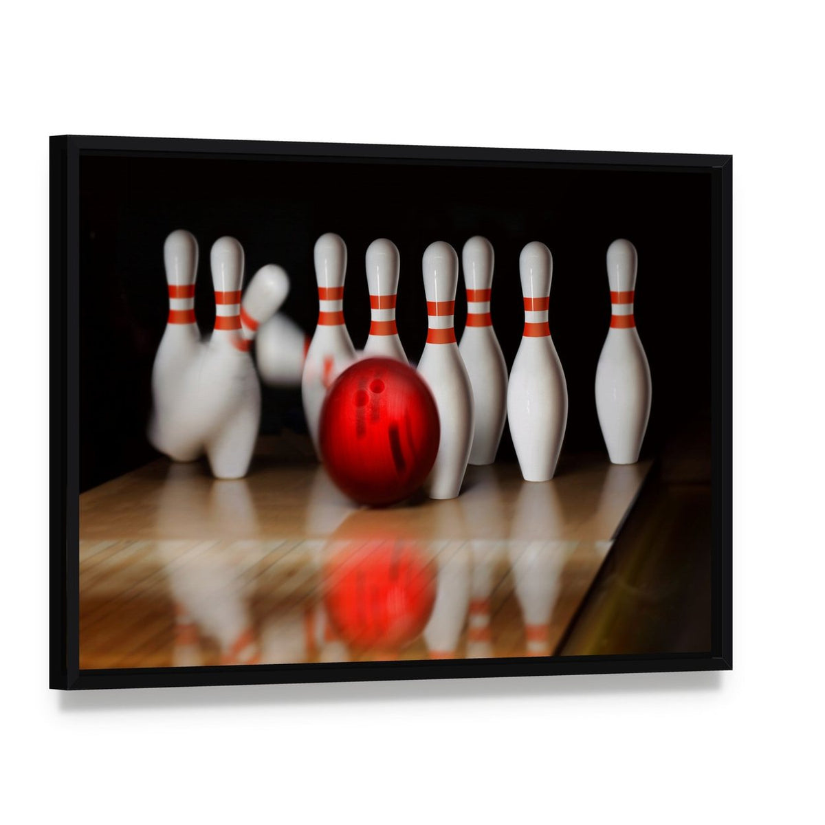 Bowling Strike Canvas Wall Art, framed canvas in a black floater frame, angled product view