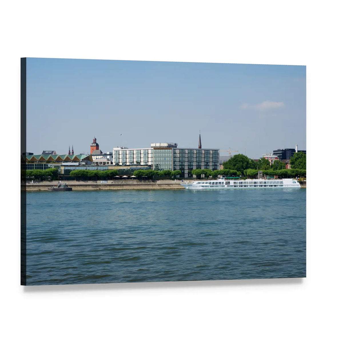 Riverfront Cityscape with Cruise Ship Canvas Wall Art, single panel gallery wrapped canvas, angled product view