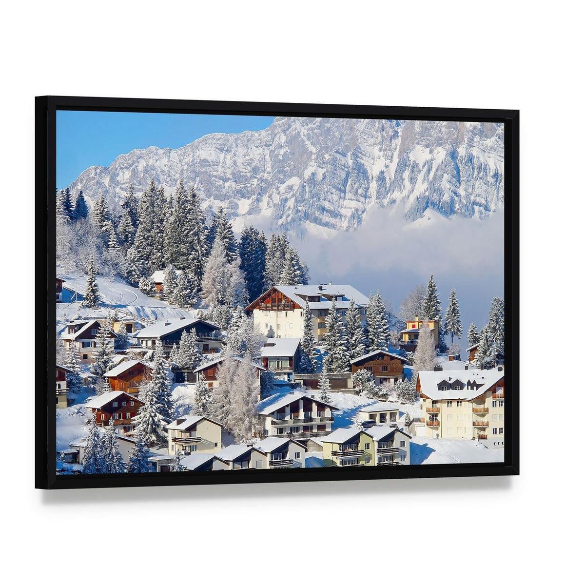 Winter Holiday Houses in Swiss Alps Canvas Wall Art, framed canvas in a black floater frame, angled product view