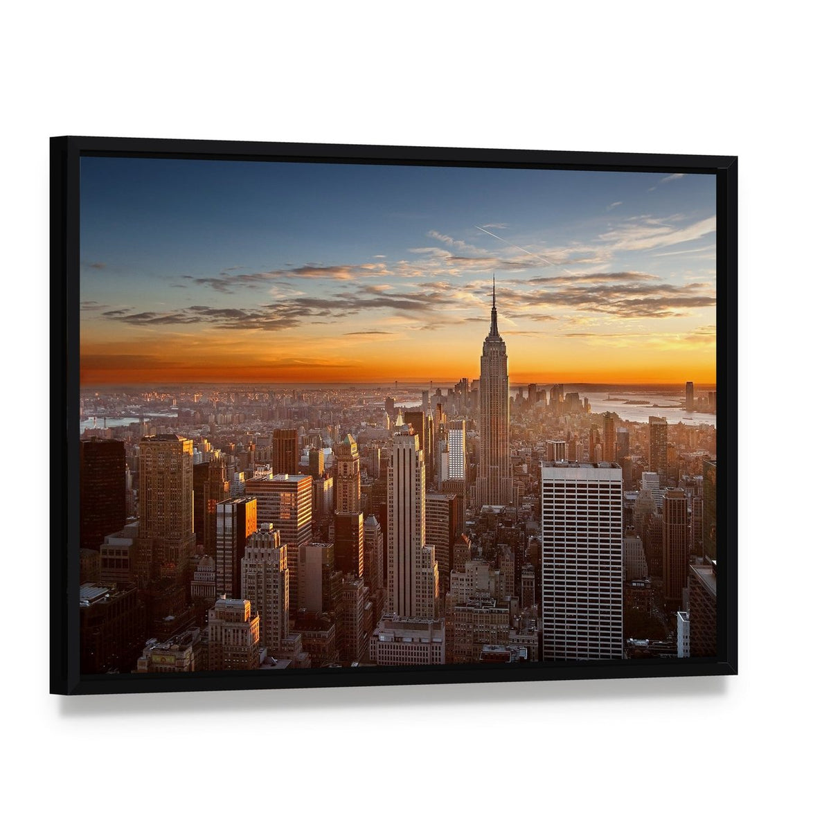 Sunset Over Manhattan Canvas Wall Art, framed canvas in a black floater frame, angled product view