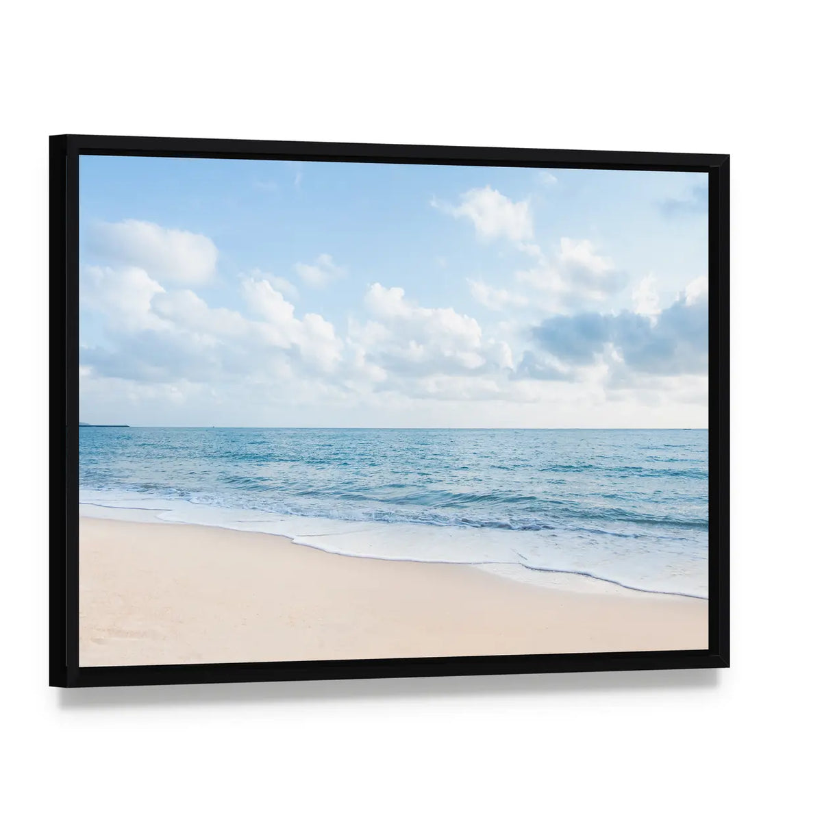 White Sand Beach Canvas Wall Art, framed canvas in a black floater frame, angled product view