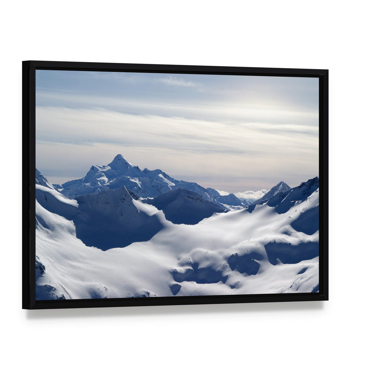 Caucasus Mountains Canvas Wall Art, framed canvas in a black floater frame, angled product view