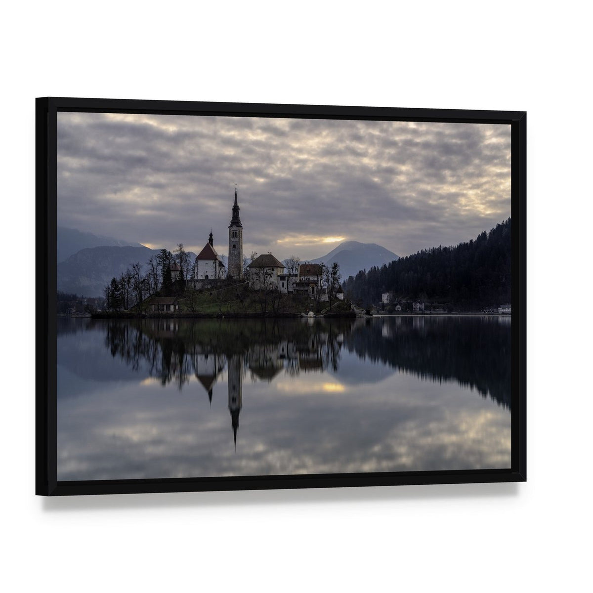 Glacial Lake Bled Reflection Canvas Wall Art, framed canvas in a black floater frame, angled product view