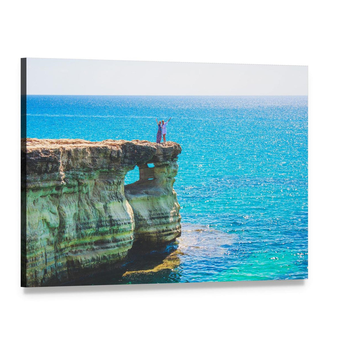 Cave Lagoon with Couple on Cliff Canvas Wall Art, single panel gallery wrapped canvas, angled product view