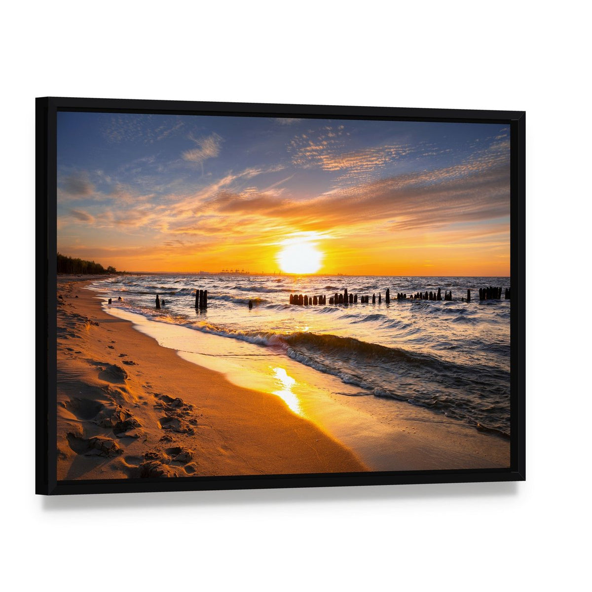 Glowing Beach Sunset with Footprints Canvas Wall Art, framed canvas in a black floater frame, angled product view