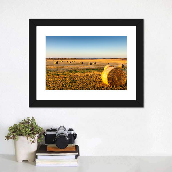 Sunset Hay Bales in Field Canvas Wall Art