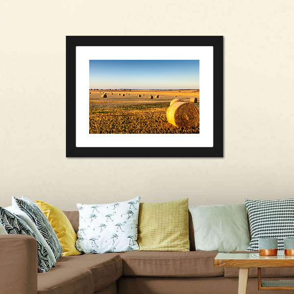 Sunset Hay Bales in Field Canvas Wall Art