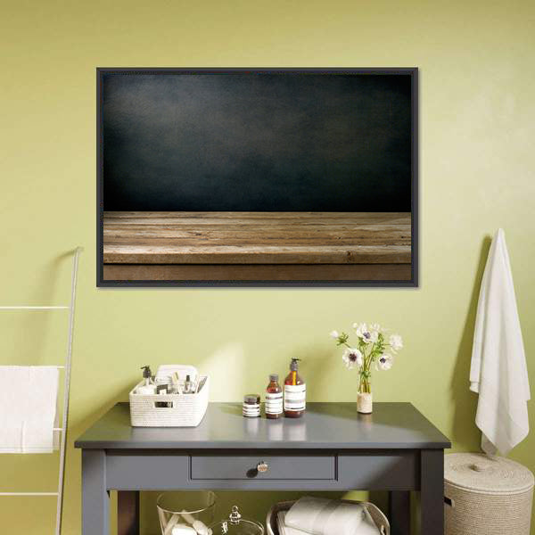 Wooden Table Against Grunge Black Canvas Wall Art