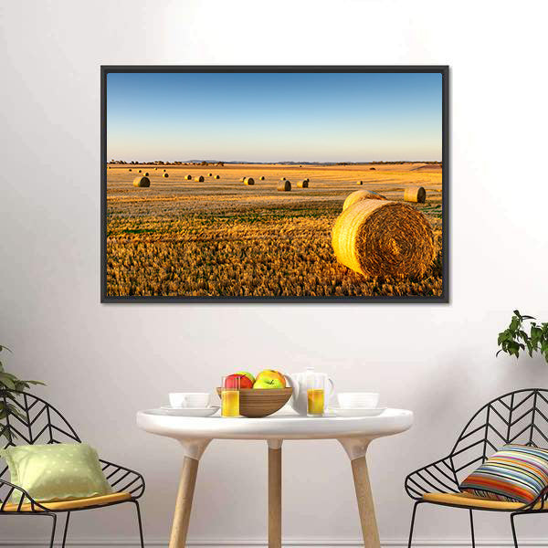 Sunset Hay Bales in Field Canvas Wall Art