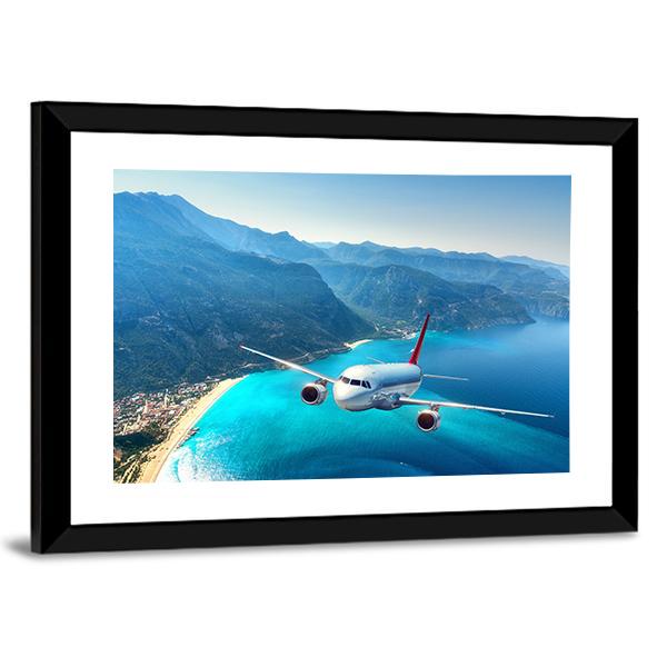 Airplane Flying Over Sea Canvas Wall Art-3 Horizontal-Gallery Wrap-25" x 16"-Tiaracle