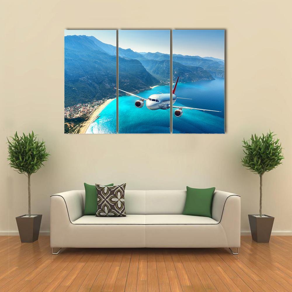Airplane Flying Over Sea Canvas Wall Art-3 Horizontal-Gallery Wrap-37" x 24"-Tiaracle