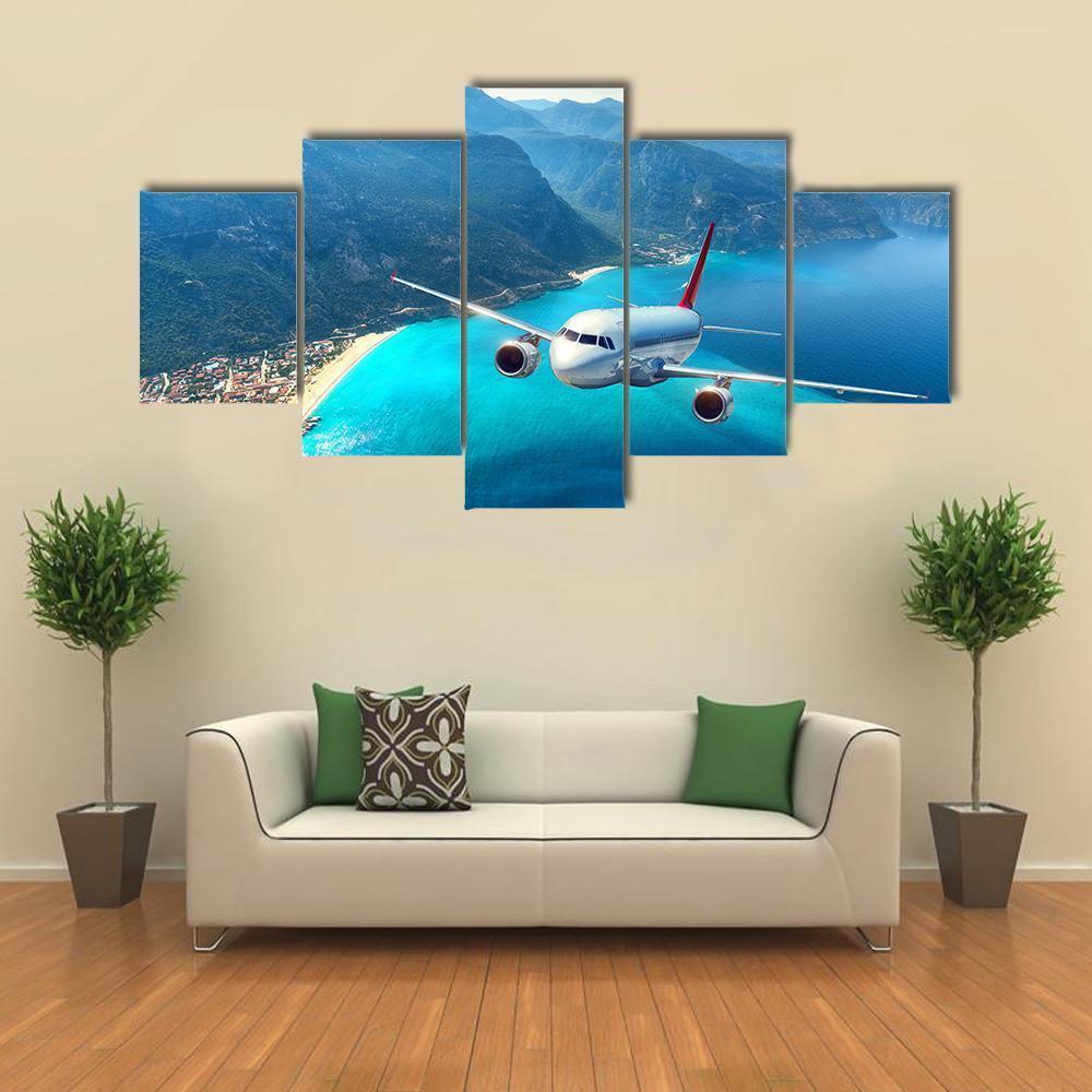 Airplane Flying Over Sea Canvas Wall Art-5 Star-Gallery Wrap-62" x 32"-Tiaracle