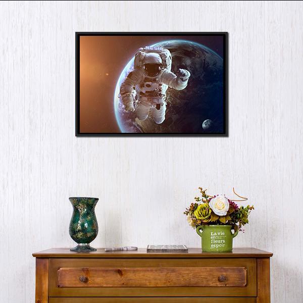 Astronaut Near Planet Earth Canvas Wall Art-1 Piece-Floating Frame-24" x 16"-Tiaracle