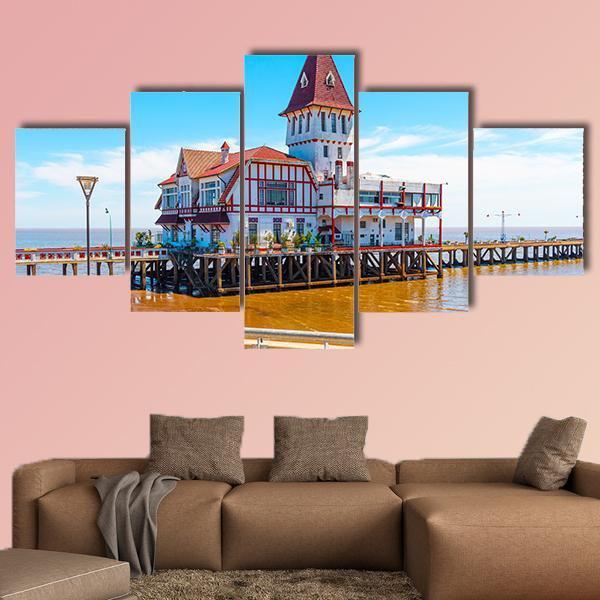 Building & Pier At Shore Canvas Wall Art-5 Star-Gallery Wrap-62" x 32"-Tiaracle
