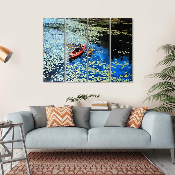Canoeing In Water Lilies Canvas Wall Art-4 Horizontal-Gallery Wrap-34" x 24"-Tiaracle