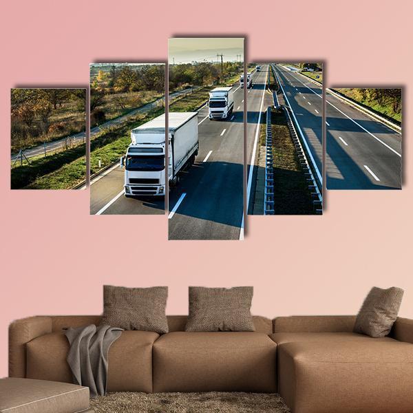 Caravan Of White Trucks Canvas Wall Art-5 Star-Gallery Wrap-62" x 32"-Tiaracle
