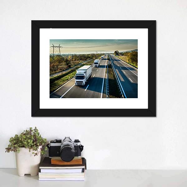 Caravan Of White Trucks Canvas Wall Art-1 Piece-Framed Print-20" x 16"-Tiaracle