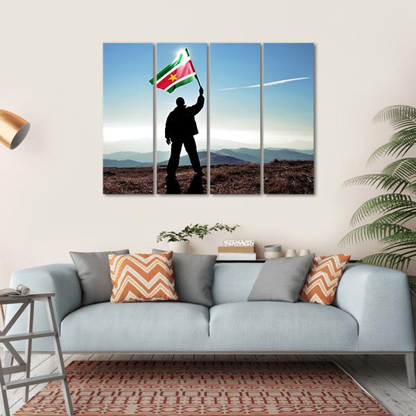 Man With Waving Suriname Flag Canvas Wall Art-4 Horizontal-Gallery Wrap-34" x 24"-Tiaracle