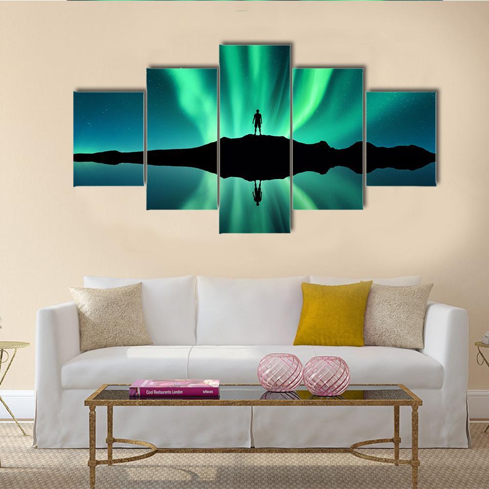Standing Man Against Aurora Borealis Canvas Wall Art-5 Star-Gallery Wrap-62" x 32"-Tiaracle