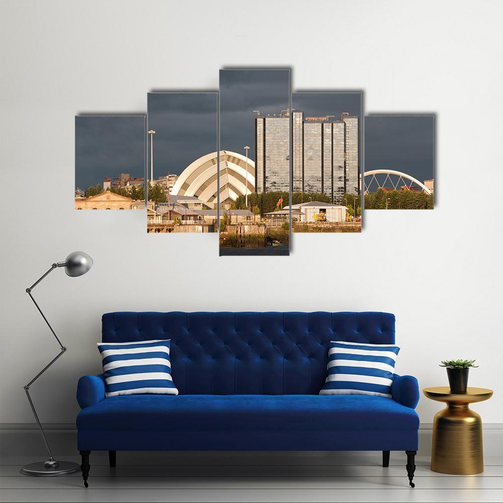 Sunlight On Buildings As Storm Clouds Canvas Wall Art-5 Star-Gallery Wrap-62" x 32"-Tiaracle
