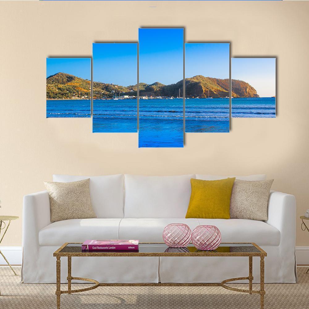 View Of Empty Blue Water Beach Canvas Wall Art-5 Star-Gallery Wrap-62" x 32"-Tiaracle