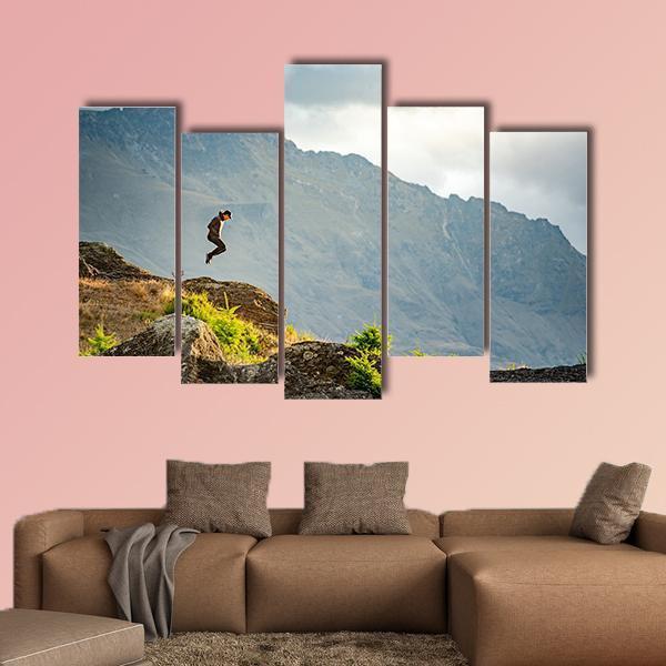 Young Man Jumping On Queenstown Hill Canvas Wall Art-5 Pop-Gallery Wrap-47" x 32"-Tiaracle