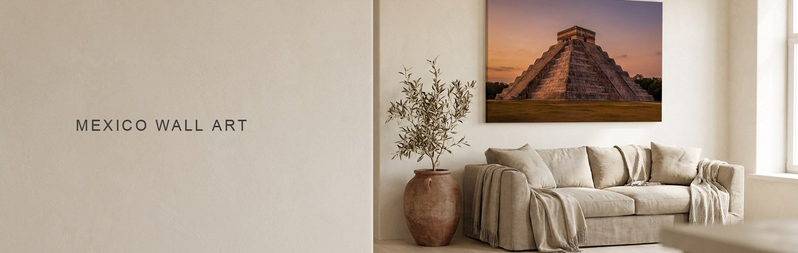 Mexico wall art in a warm neutral living room with a Chichen Itza pyramid canvas
