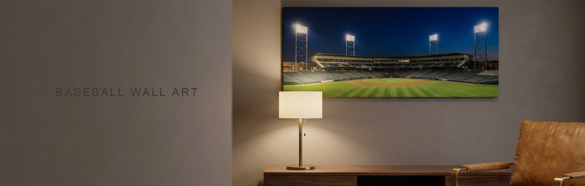 Baseball wall art above a games room console, an empty floodlit stadium canvas