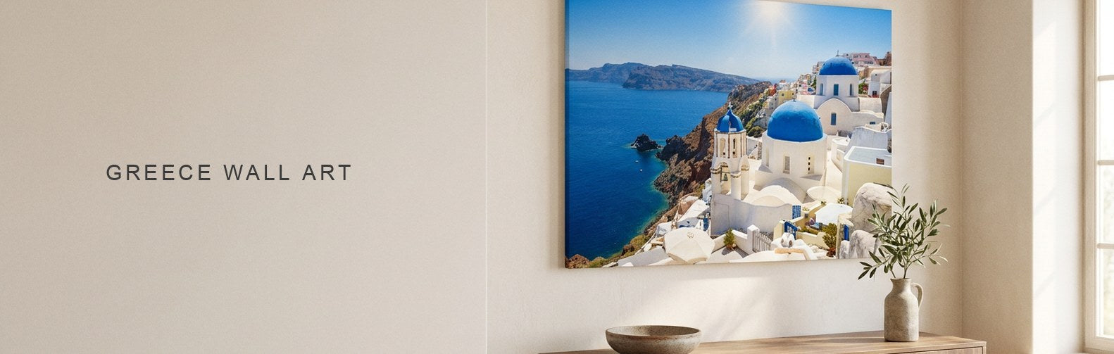 Greece wall art above a sideboard, a blue domed church at Oia over the Aegean